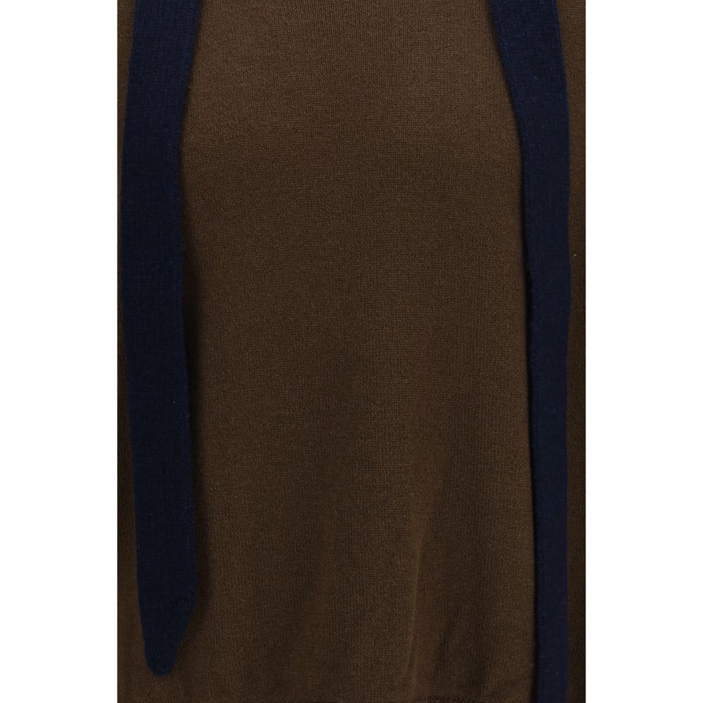 Cardigan by Sacai for men in merino wool brown showcases a captivating silhouette, artfully detailed with a captivating and for a truly sophisticated captivating look.