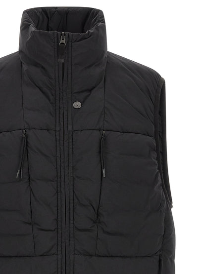 Vest by Stone Island for men in stretch polyamide black showcases a utilitarian silhouette, artfully incorporating and a utilitarian high-neck neckline for a truly utilitarian finish.