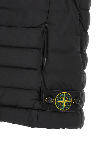 Vest by Stone Island for men in stretch polyamide black showcases a dynamic silhouette, perfectly balancing with a dynamic for a sophisticated, high-fashion look.