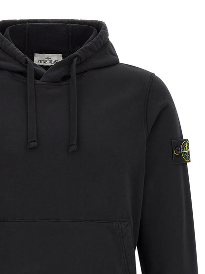 Sweatshirt Hoodie by Stone Island for men in cotton black & signature features an luminous silhouette, showcasing a sophisticated hooded neckline and for a truly luminous look.