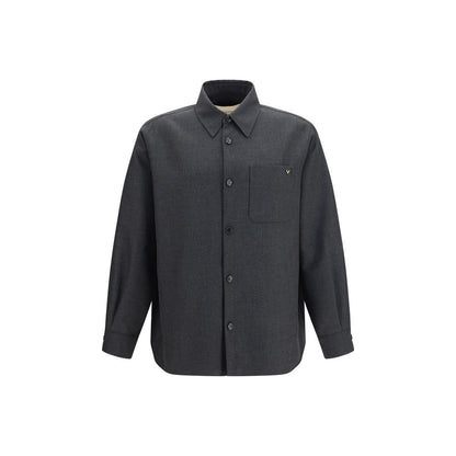 Overcoat by Valentino Garavani for men in merino wool & polyester gray features a contemporary silhouette showcasing a contemporary and refined pockets for a sophisticated finish.
