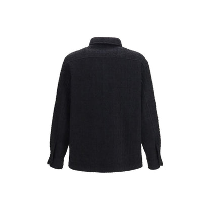 Overcoat by Valentino Garavani for men in polyamide polyester cotton & merino wool black showcases a enveloping silhouette, detailed with distinctive pockets and a enveloping .