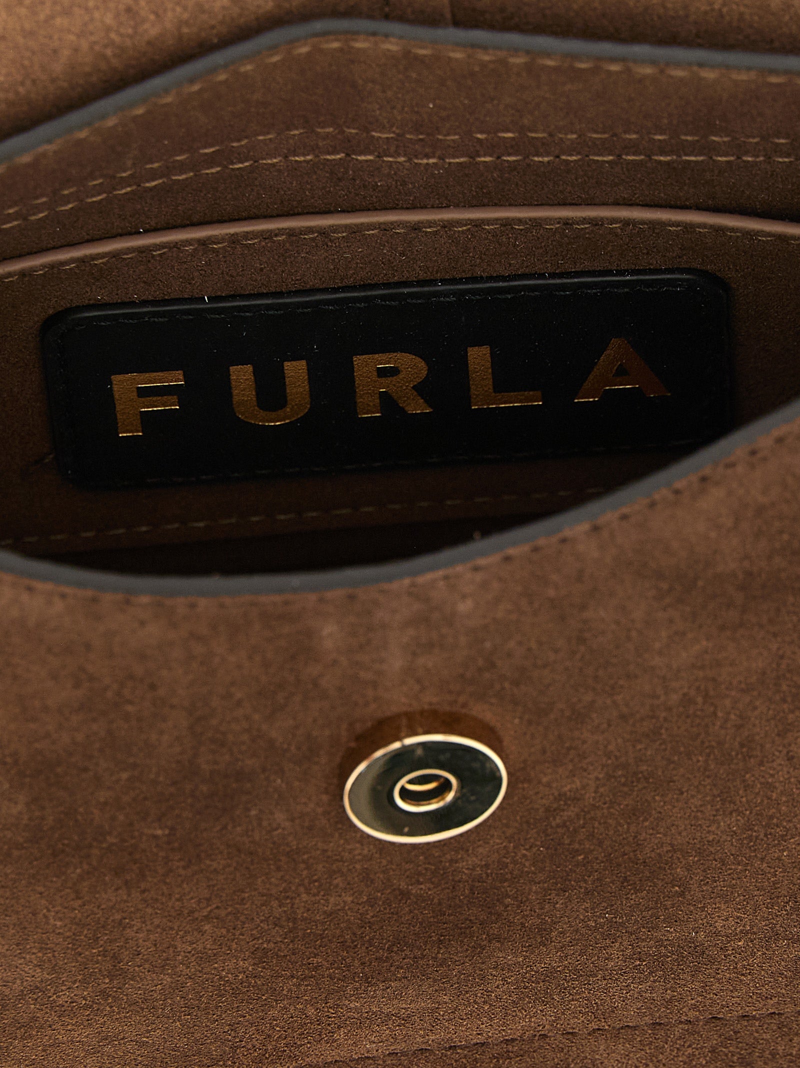 Mini Handbag by Furla for women in calfskin leather brown & gold presents a ornamental silhouette, showcasing a secure magnetic & buckle, ample , and versatile shoulder-strap, handle & adjustable-strap for a ornamental finish.