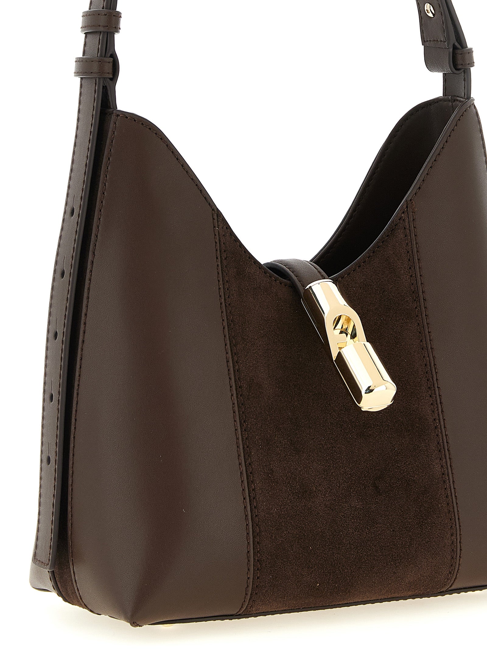 Shoulder Bag by Furla for women in calfskin leather brown & gold features a effortless sophistication silhouette, secured by a with ample and versatile shoulder-strap, adjustable-strap & handle for a effortless sophistication finish.