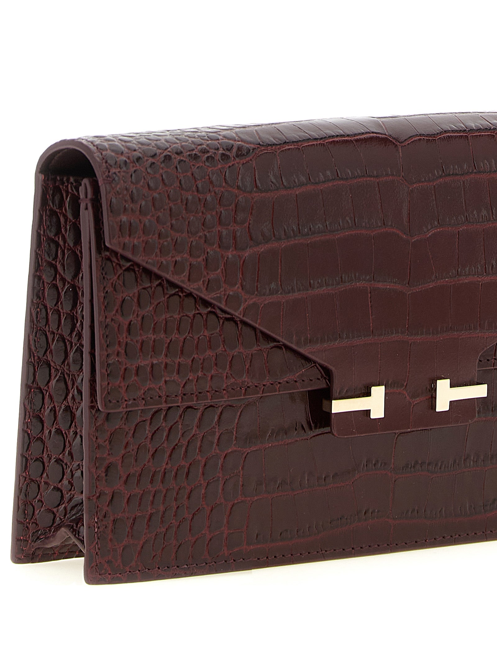 Mini Crossbody Clutch Handbag by Tom Ford for women in bio-acetate bordeaux, gold & print features a architectural silhouette, showcasing a secure , ample built-in-compartments & cardholder, and versatile crossbody-strap & adjustable-strap for a architectural finish.