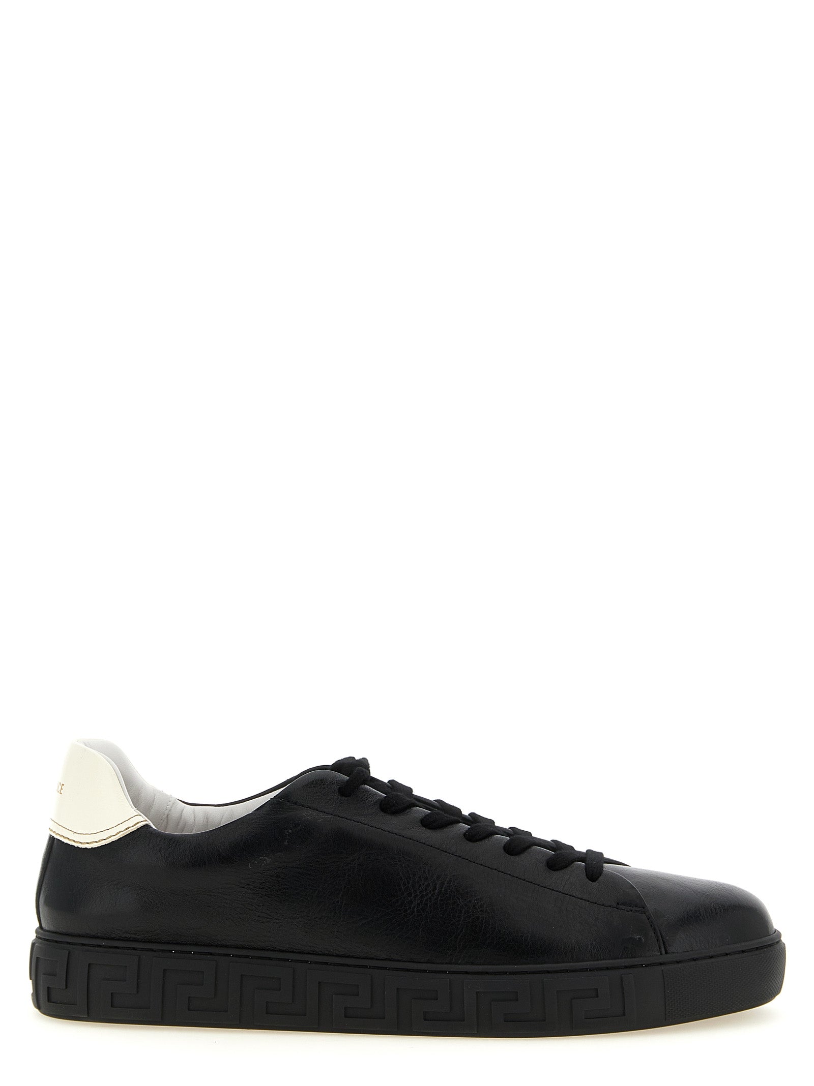Sneakers by Versace for men in calfskin leather bicolour, black, gold, white, patterned & signature presents a on trend silhouette from the Play Men's Low Top Calfskin Leather Sneakers collection, showcasing a on trend low-top style for an elevated aesthetic.