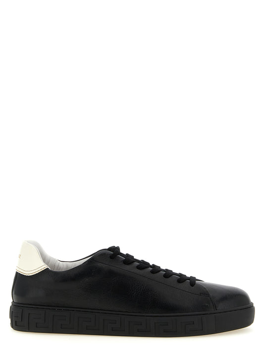 Sneakers by Versace for men in calfskin leather bicolour, black, gold, white, patterned & signature presents a on trend silhouette from the Play Men's Low Top Calfskin Leather Sneakers collection, showcasing a on trend low-top style for an elevated aesthetic.