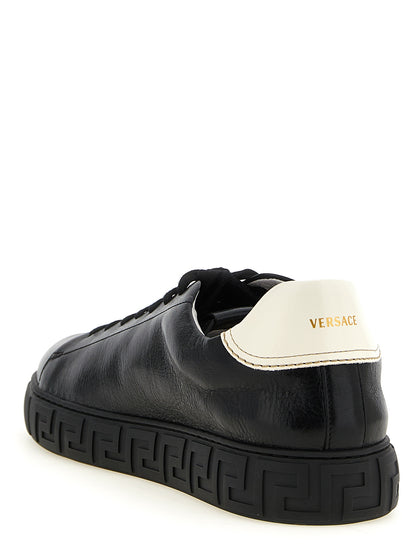Sneakers by Versace for men in calfskin leather bicolour, black, gold, white, patterned & signature features an versatile design from the Play Men's Low Top Calfskin Leather Sneakers collection, highlighting a versatile low-top style for a premium, high-fashion look.