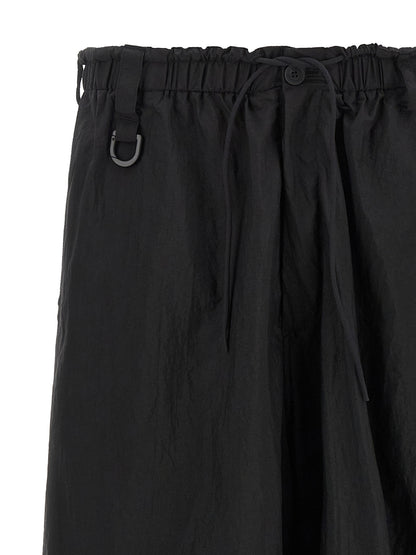 Cargo Pants by Y-3 for men in polyamide gradient & black features a architectural relaxed-fit & wide with a architectural long and architectural .