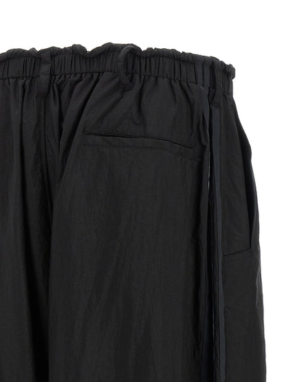 Cargo Pants by Y-3 for men in polyamide gradient & black features an urban chic relaxed-fit & wide with a and long, creating a urban chic aesthetic for "Moon Behind the Hill".