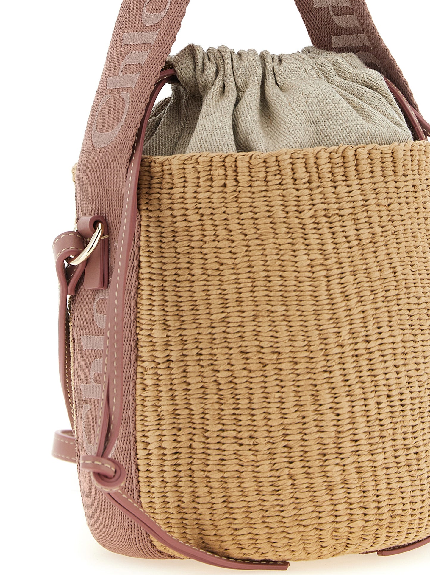 Small Bucket Handbag by Chloé for women in calfskin suede leather beige, natural & signature features a signature silhouette, showcasing a secure drawstring and signature with versatile shoulder-strap & handle for a sophisticated look.