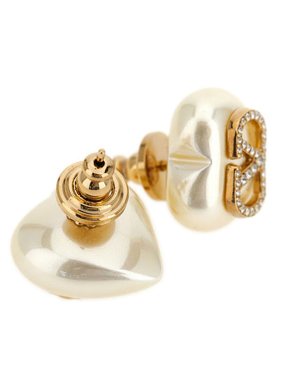 Earrings by Valentino Garavani for women in denim cotton gold, pearl & signature showcases a captivating silhouette, featuring an captivating from the Heart V Logo Women's Gold Brass & Pearls Earrings collection for a captivating finish.