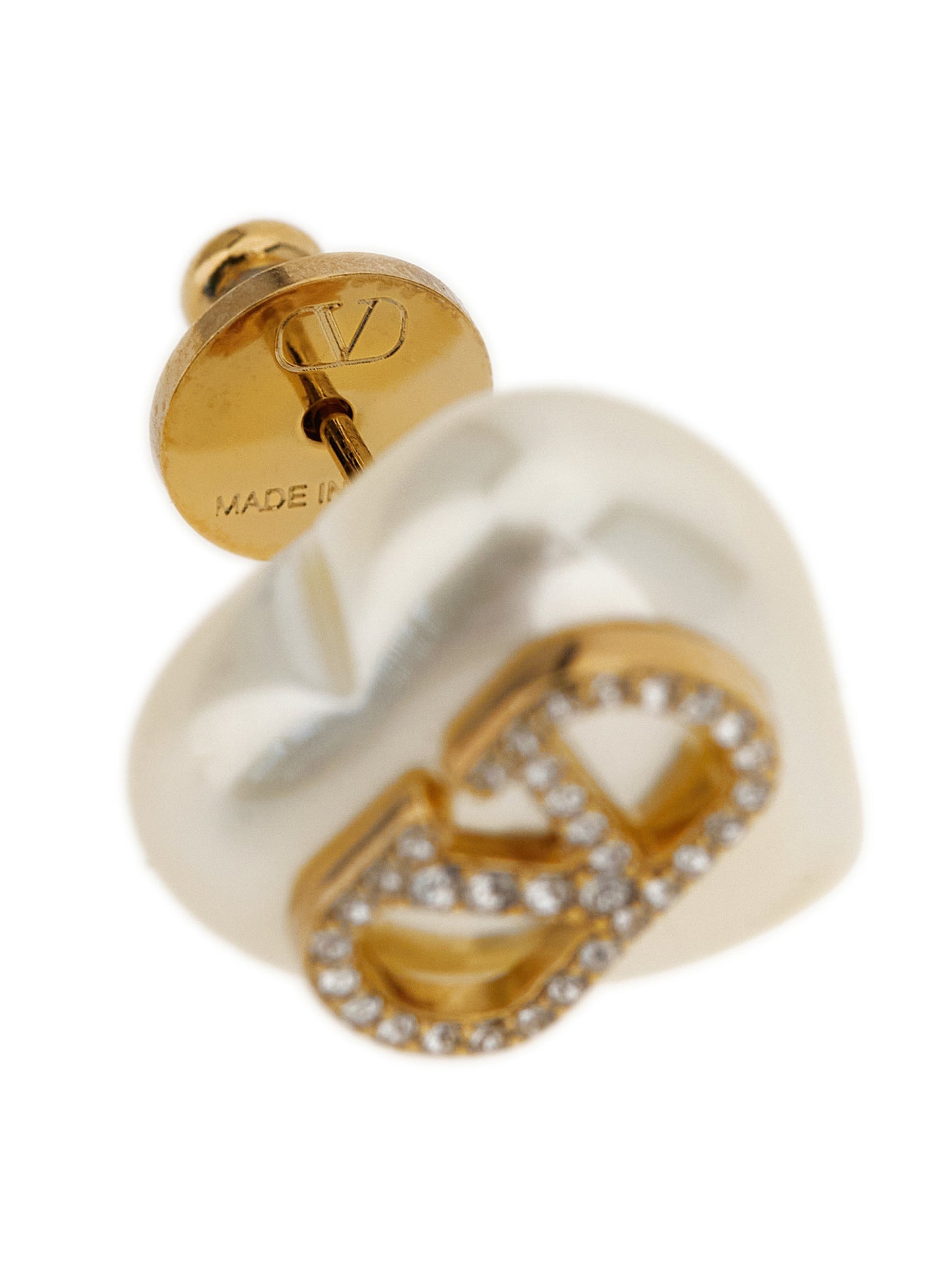 Earrings by Valentino Garavani for women in denim cotton gold, pearl & signature presents a resplendent silhouette, artfully capturing the essence of the Heart V Logo Women's Gold Brass & Pearls Earrings with a resplendent for a sophisticated look.