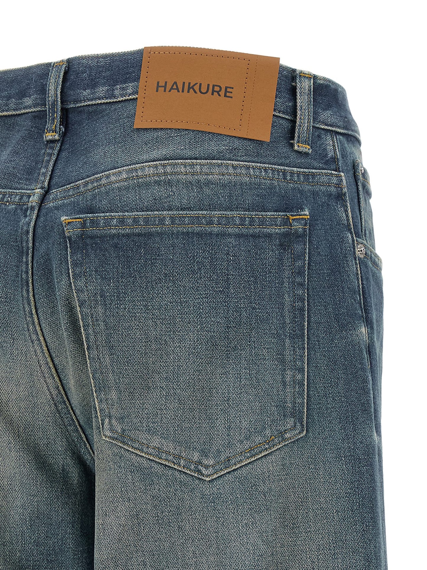 Jeans by Haikure for women in denim cotton blue, brown & silver features an refined tailoring silhouette, showcasing a premium flared & wide with a and long cut for a refined tailoring look.