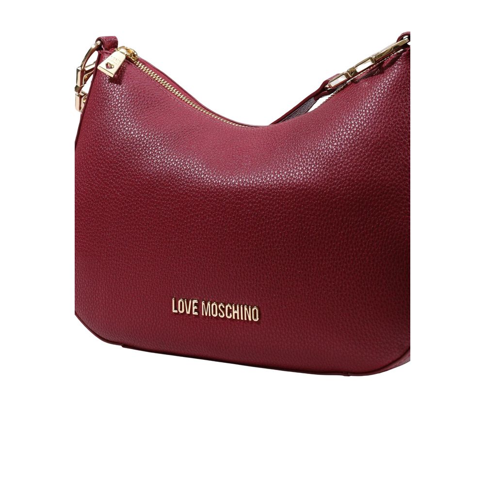This Medium Handbag by Love Moschino for women in polyethylene & polyurethane and gold & purple presents a sculptural silhouette featuring a secure , ample , and versatile adjustable-strap for a sculptural finish.
