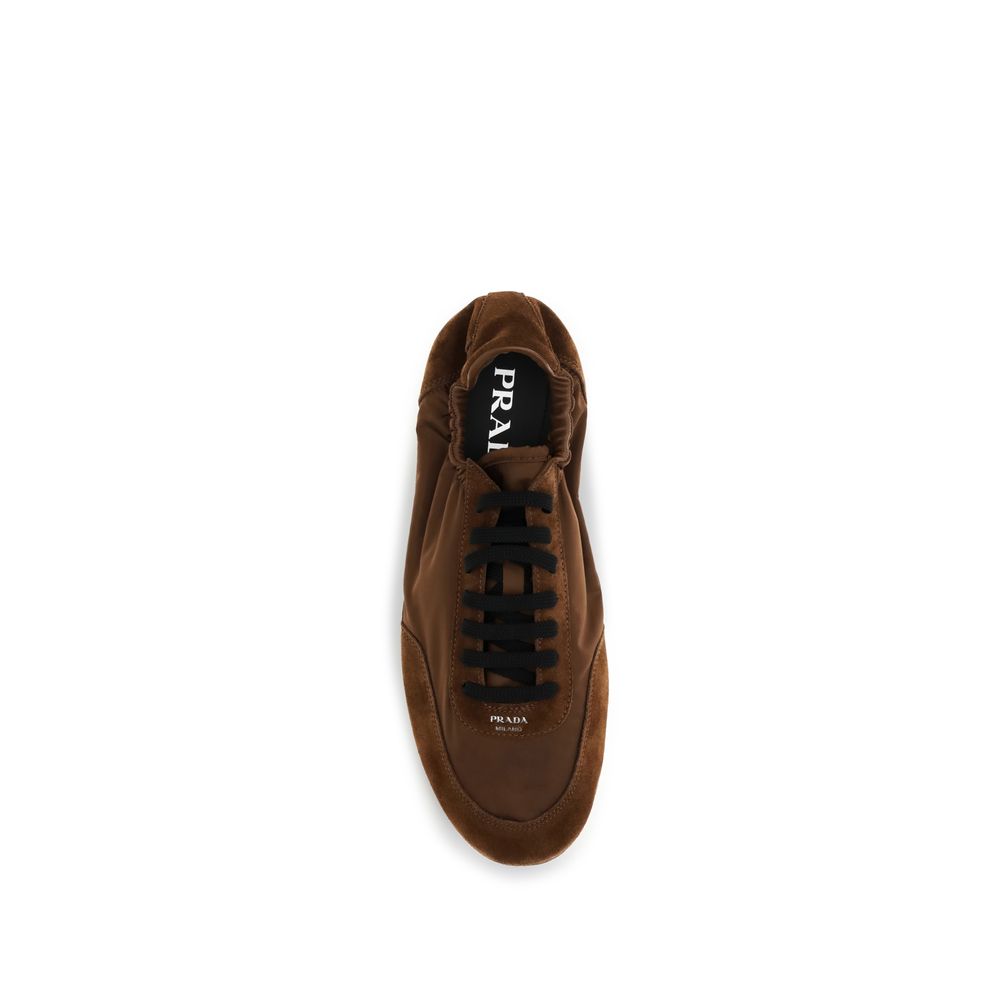 Athletic Sneakers by Prada for men in nylon suede leather brown & monogram showcases a architectural silhouette, artfully capturing the essence of the Men's Athletic Nylon Suede Leather Sneakers with its signature architectural athletic style construction.
