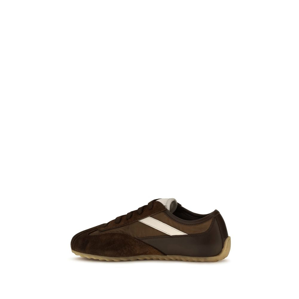 Athletic Sneakers by Alexander McQueen for women in suede leather brown features an effortless chic silhouette, showcasing the signature athletic style of the Women's Athletic Suede Leather Sneakers collection with a truly effortless chic finish.
