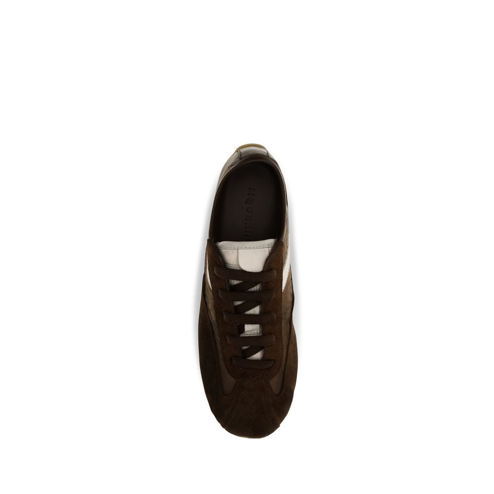Athletic Sneakers by Alexander McQueen for women in suede leather brown features an exquisite silhouette, showcasing the premium athletic style of the Women's Athletic Suede Leather Sneakers with an exquisite finish.