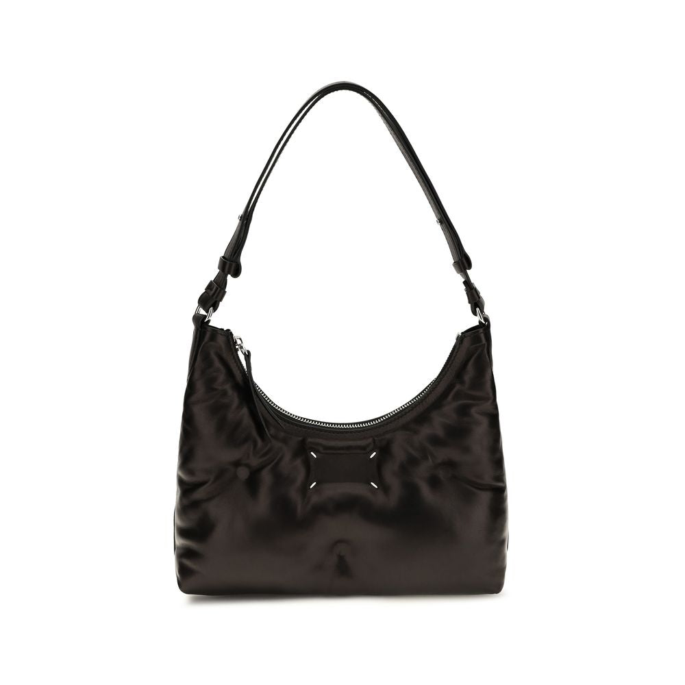Small Quilted Shoulder Hobo Bag by Maison Margiela for women in lambskin leather black & signature showcases a enviable silhouette, artfully detailed with a secure zipper, organized , and versatile shoulder-strap for a enviable look.