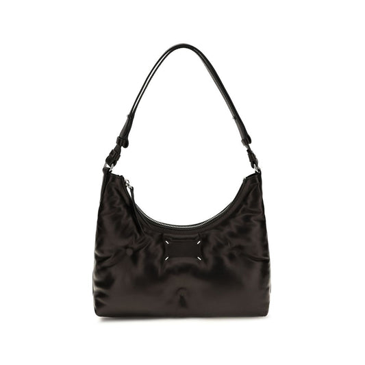 Small Quilted Shoulder Hobo Bag by Maison Margiela for women in lambskin leather black & signature showcases a enviable silhouette, artfully detailed with a secure zipper, organized , and versatile shoulder-strap for a enviable look.