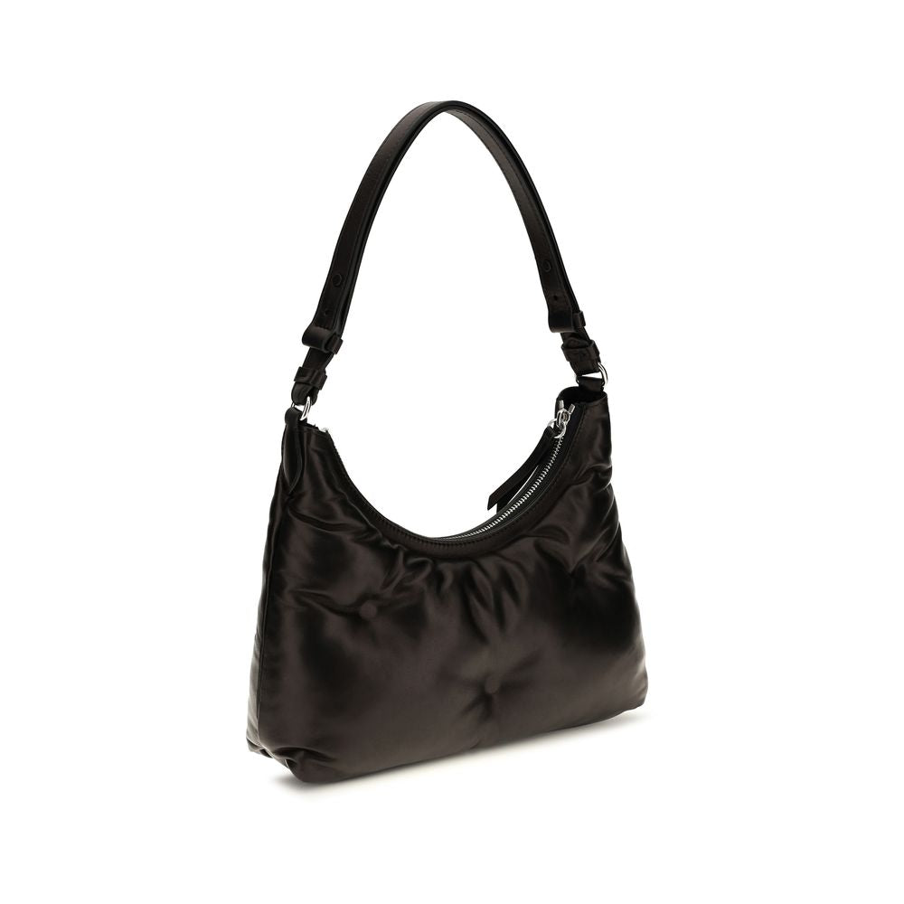 Small Quilted Shoulder Hobo Bag by Maison Margiela for women in lambskin leather black & signature features a enviable silhouette, showcasing a secure zipper, ample , and enviable shoulder-strap for a enviable finish.