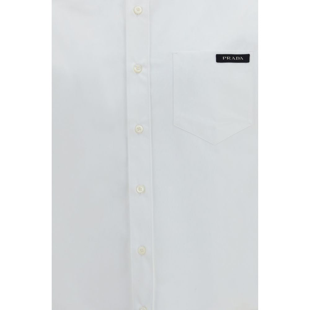 Dress Shirt by Prada for men in cotton pearl, white & signature showcases a sleek silhouette, elegantly detailed with a sleek and for a sleek finish.
