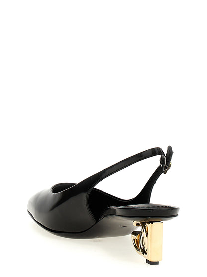 Mid-Heel Slingback Pumps Heels by Dolce & Gabbana for women in calfskin leather & carbon black & gold showcases a exquisite silhouette, perfectly accentuating Jackie Women's Calfskin Leather & Carbon Mid-Heel Slingback Pumps Heels with a exquisite mid-heel and exquisite square toe style.