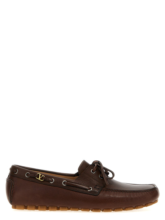 Loafer Slip-On Lace-Up Shoes by Valentino Garavani for men in buffalo leather brown & signature features an dynamic silhouette from the V Logo Men's Buffalo Leather Loafer Slip-On Lace-Up Shoes collection, defined by a dynamic and for a dynamic look.