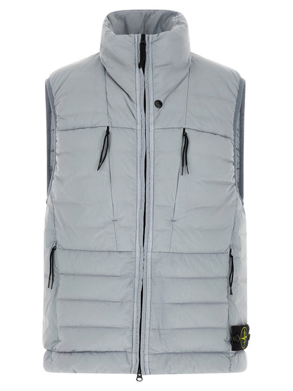 Vest by Stone Island for men in stretch polyamide gray showcases a utilitarian silhouette, artfully incorporating lightweight, pockets & insulated and a utilitarian high-collar neckline for a truly utilitarian finish.