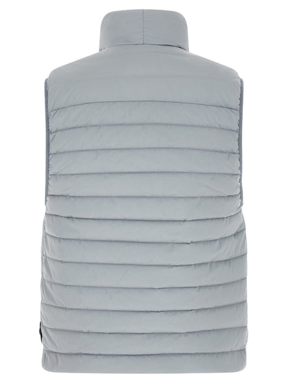 Vest by Stone Island for men in stretch polyamide gray features a enviable silhouette, elegantly detailed with a enviable high-collar neckline and functional lightweight, pockets & insulated for a enviable finish.