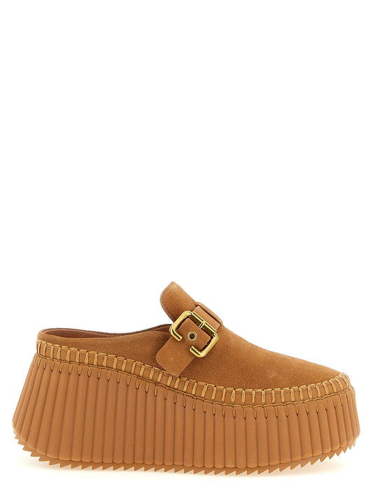 Platform Wedge Sandals by Chloé for women in suede calfskin leather and beige, camel & gold presents a captivating silhouette, showcasing the signature style of the Women's Suede Calfskin Leather Platform Wedge Sandals with a captivating platform wedge and captivating .