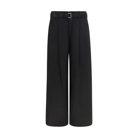 Chinos Pants by Sacai for men in cotton black features an utilitarian-chic silhouette, showcasing a utilitarian-chic wide & oversized with a long cut and for a refined look.