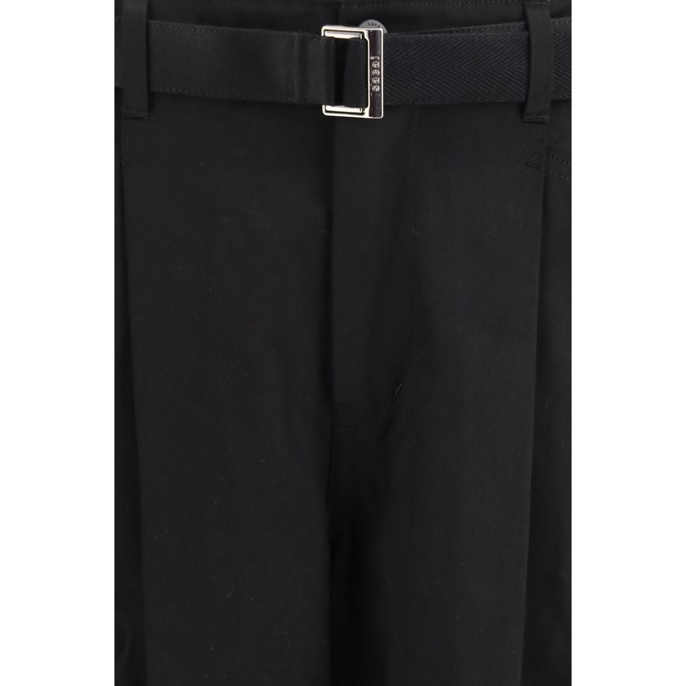 Chinos Pants by Sacai for men in black features a modern silhouette, showcasing a modern wide & oversized with a long and for a refined finish.
