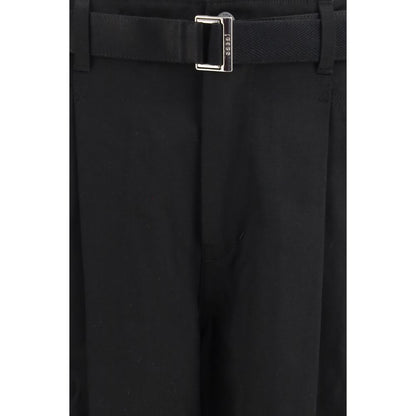 Chinos Pants by Sacai for men in black features a modern silhouette, showcasing a modern wide & oversized with a long and for a refined finish.