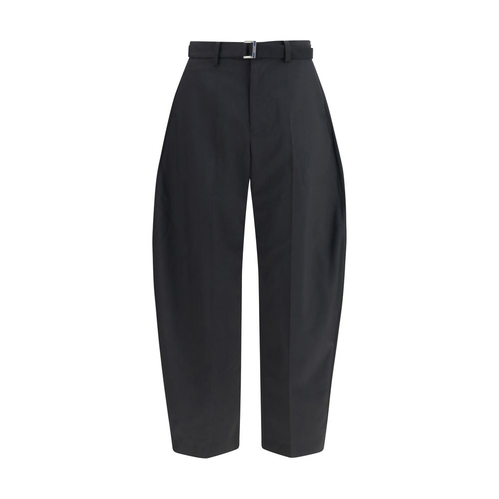 Casual Pants by Sacai for men in cupro wool & polyester black & silver features an refined tailoring silhouette, showcasing a premium relaxed-fit, wide & oversized with a and long cut for a refined tailoring look.