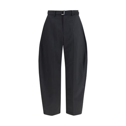 Casual Pants by Sacai for men in cupro wool & polyester black & silver features an refined tailoring silhouette, showcasing a premium relaxed-fit, wide & oversized with a and long cut for a refined tailoring look.