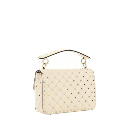 This Crossbody Flap Clutch Handbag by Valentino Garavani for women in nappa lambskin leather and beige & signature presents a sculptural silhouette featuring a secure flap, ample , and versatile crossbody-strap, handle, adjustable-strap & detachable-strap for a sculptural finish.