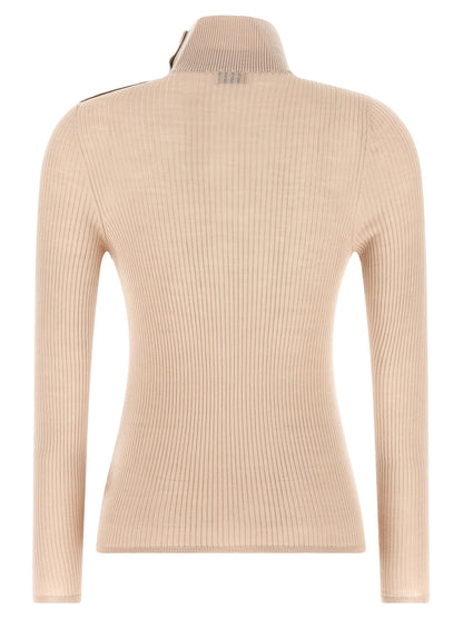 Cardigan by Moncler for women in merino virgin wool beige showcases a captivating silhouette, artfully detailed with a captivating and turtle neckline for a truly sophisticated captivating look.