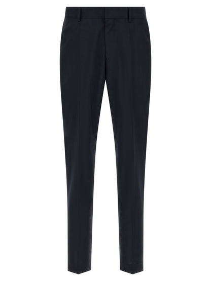 Pant Suit by Hugo Boss for men in virgin wool blue presents a sublime silhouette, showcasing a sophisticated and a sublime slim that exemplifies modern elegance.