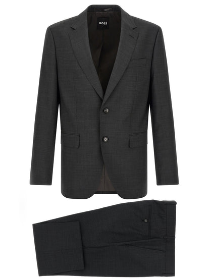 This Pant Suit by Hugo Boss for men in virgin wool gray presents a discerning silhouette, featuring a sophisticated and a discerning straight & slim for a refined and polished look.