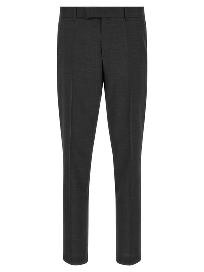 Pant Suit by Hugo Boss for men in virgin wool gray presents a sublime silhouette, showcasing a sophisticated and a sublime straight & slim that exemplifies modern elegance.