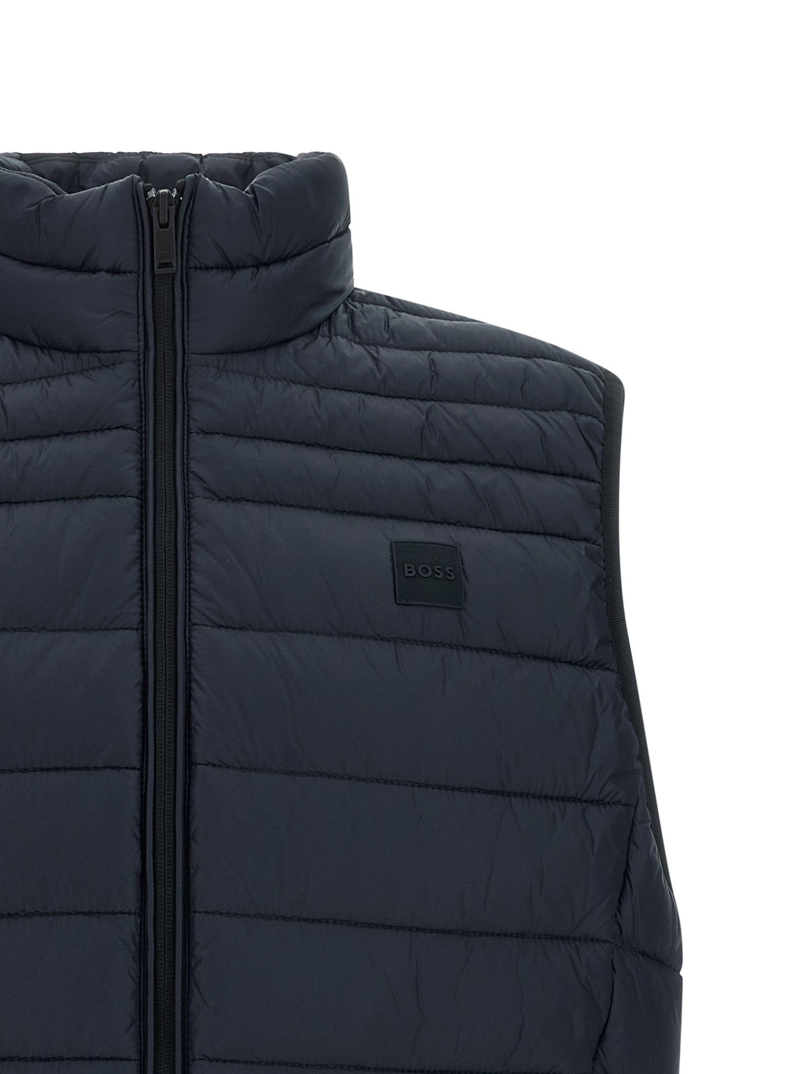 Vest by Hugo Boss for men in polyamide dark-blue features a chic silhouette, expertly detailed with a refined high-neck neckline and premium pockets for a truly chic look.