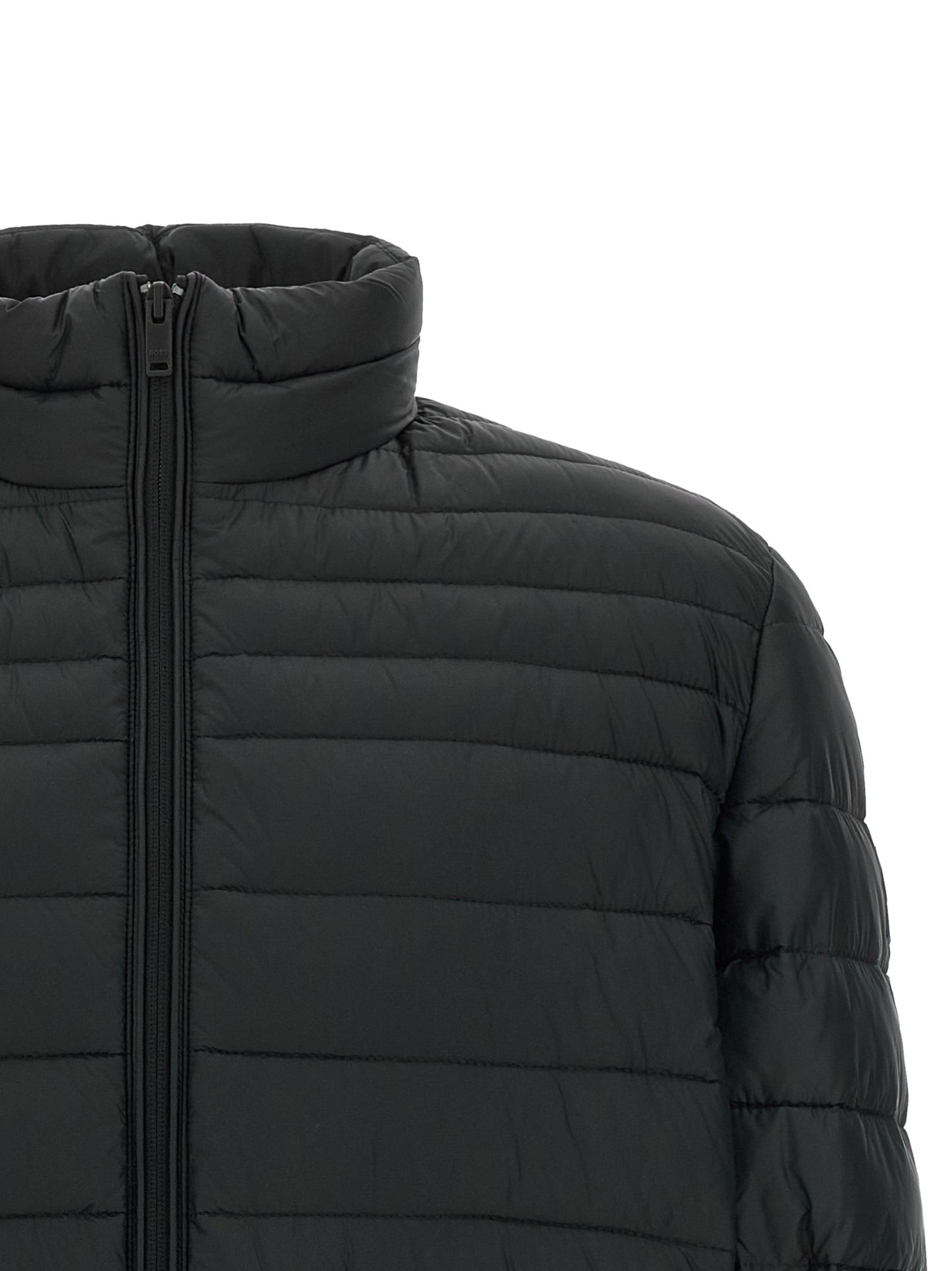 Puffer Jacket by Hugo Boss for men in polyamide black presents a effortlessly chic silhouette, showcasing a sophisticated high-neck neckline and premium pockets & insulated for a truly effortlessly chic finish.