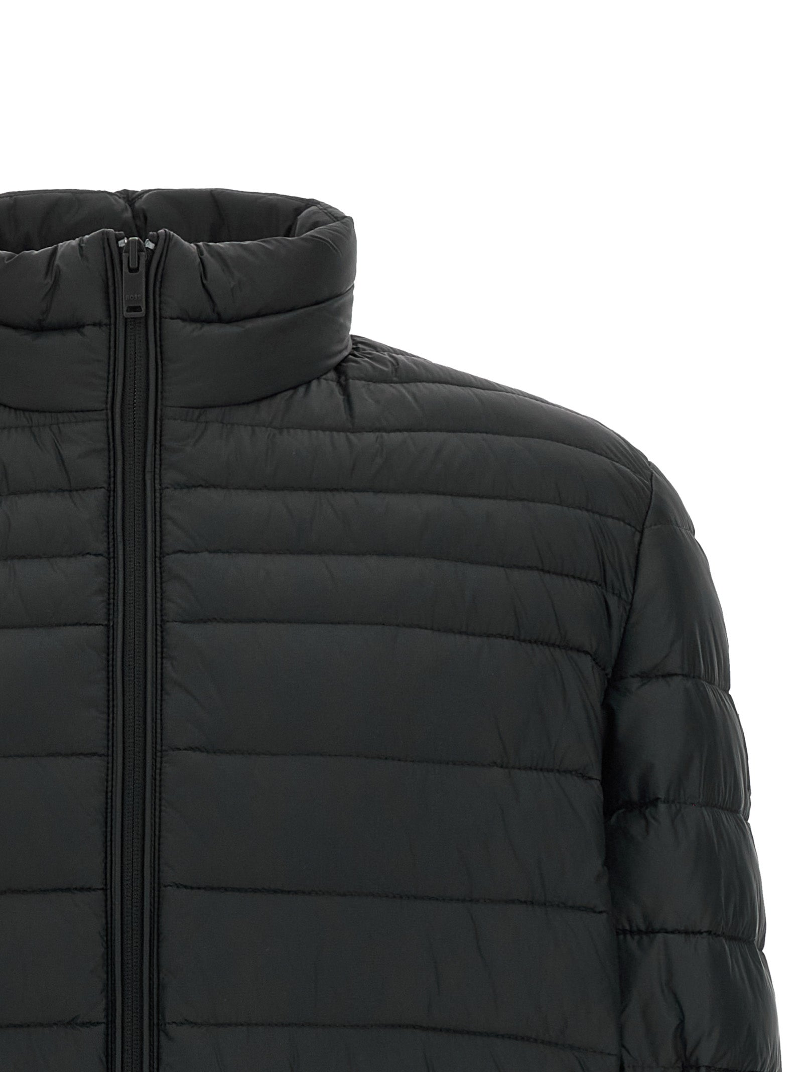 Puffer Jacket by Hugo Boss for men in polyamide black presents a effortlessly chic silhouette, showcasing a sophisticated high-neck neckline and premium pockets & insulated for a truly effortlessly chic finish.