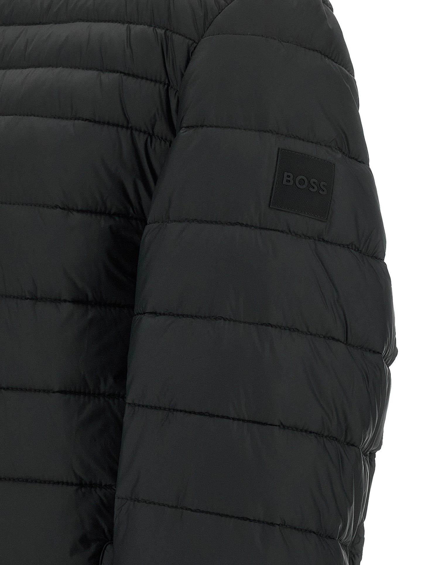 Puffer Jacket by Hugo Boss for men in polyamide black features a city-ready silhouette, detailed with pockets & insulated and a city-ready high-neck neckline.