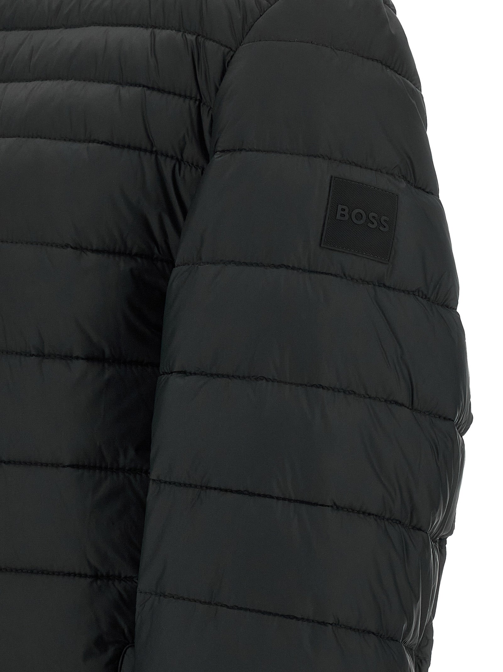 Puffer Jacket by Hugo Boss for men in polyamide black features a city-ready silhouette, detailed with pockets & insulated and a city-ready high-neck neckline.