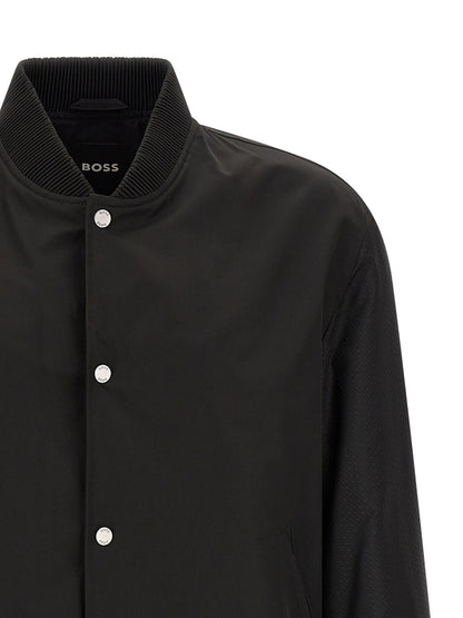 This Bomber Jacket by Hugo Boss for men in polyester black, silver, patterned, jacquard, signature & monogram exhibits a edgy silhouette, meticulously detailed with functional and a edgy for a edgy finish.