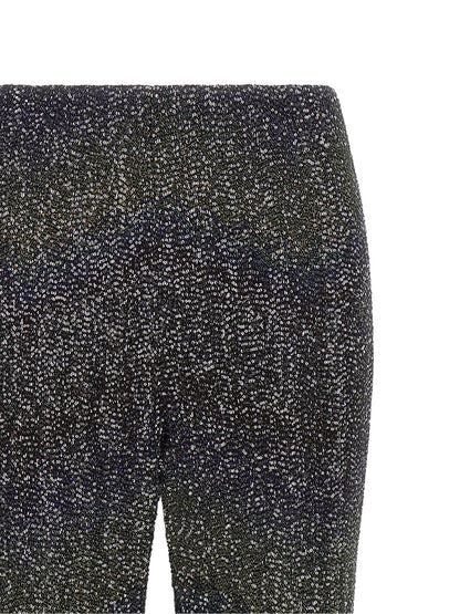 Trousers by Missoni for women in polyamide polyester & sequins multicolor presents a perennial silhouette, meticulously tailored with a flared cut, long finish, and an elegant .