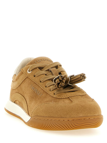 Sneakers by Twinset for women in suede leather beige, camel, gold & signature features an timeless silhouette from the Women's Low Top Suede leather Sneakers collection, showcasing a signature low-top style with an timeless finish.