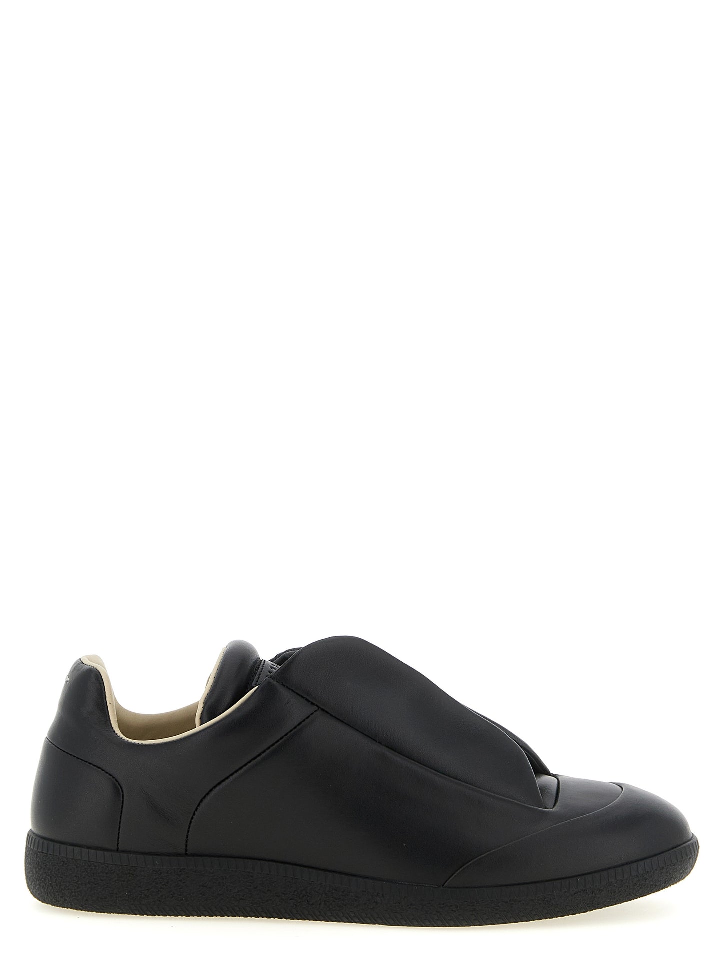 Sneakers by Maison Margiela for men in plush calfskin leather black & signature presents a impeccable silhouette as Men's Low Top Plush Calfskin Leather Sneakers, expertly defined by a impeccable low-top style for a impeccable, high-fashion look.